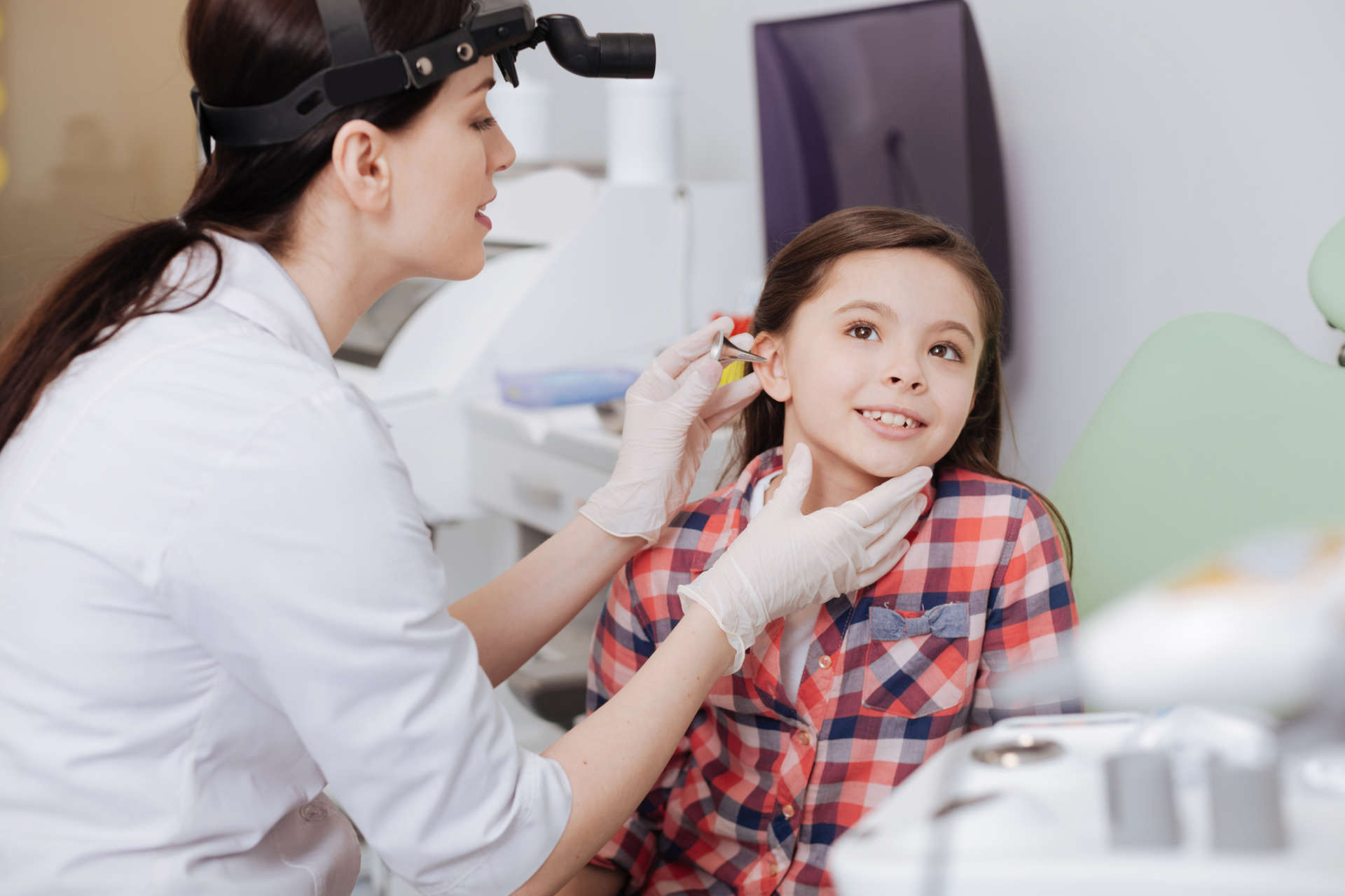 Young Girl getting her ears microsuctioned